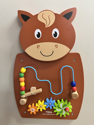 beads on a wire maze with a launch lever and a four cogs  on a horse panel