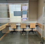 study room with 2 chairs and long counter-style workspace