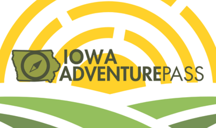 Iowa Adventure Pass with sun rising over green fields