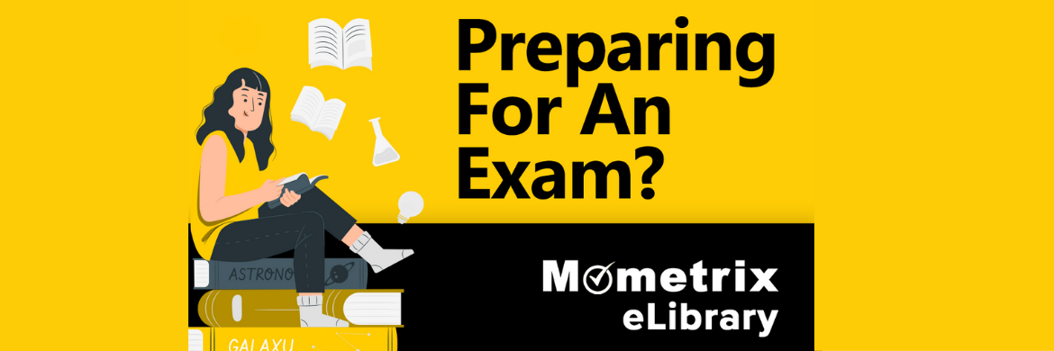 student studying on a pile of books